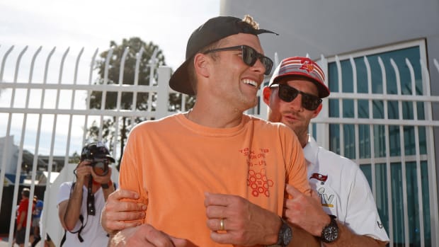 Tampa Bay Buccaneers quarterback Tom Brady (left) and quarterback Ryan Griffin after a boat parade to celebrate victory in Super Bowl LV against the Kansas City Chiefs.